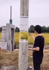 太震撼!男子将电线杆画出断裂悬浮效果非常科幻
